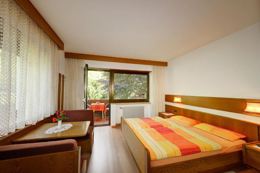 Apparthotel Taufenbrunn Parcines Habitación foto